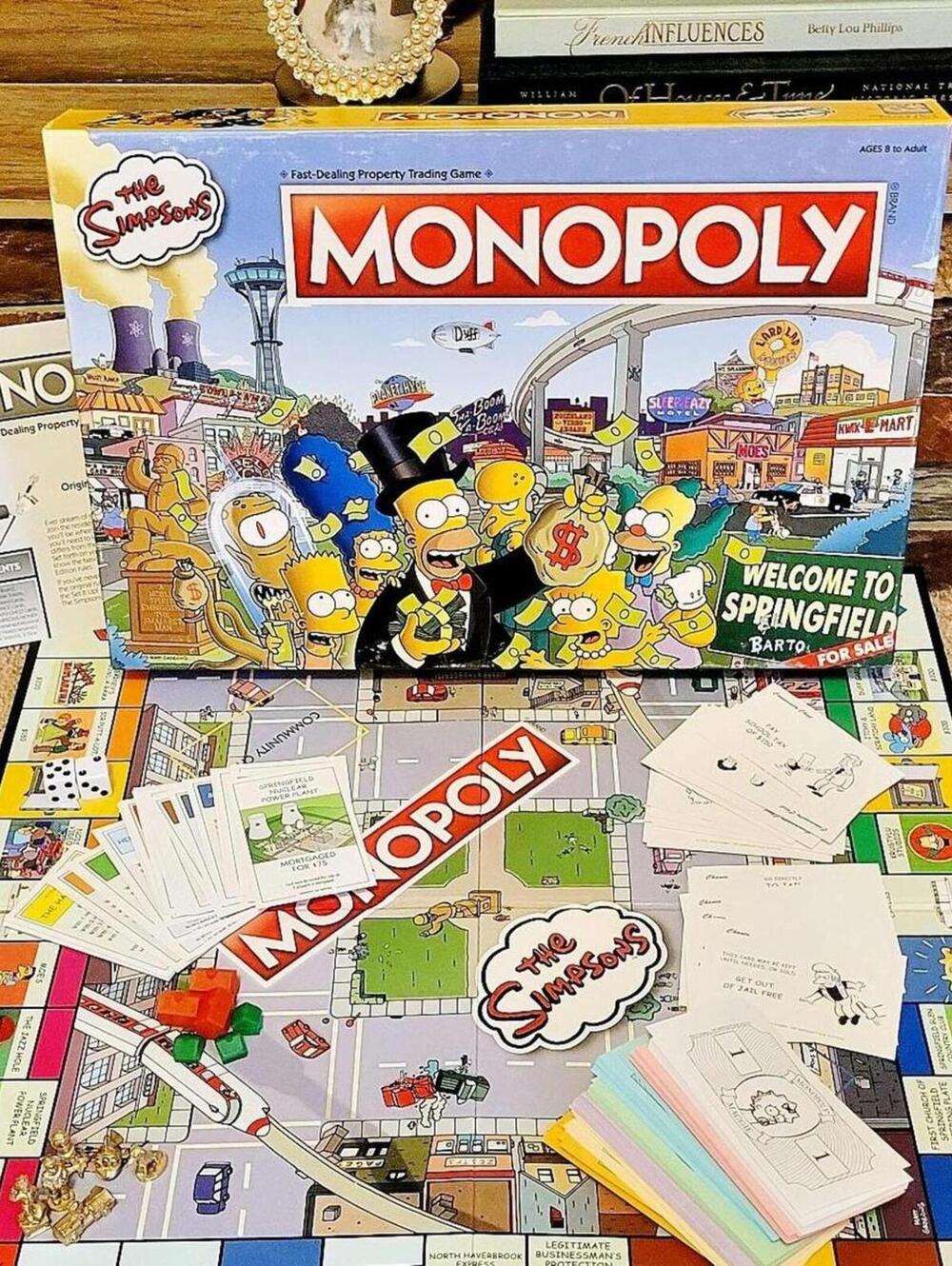 The Simpsons Monopoly board game Complete (all pieces are included)